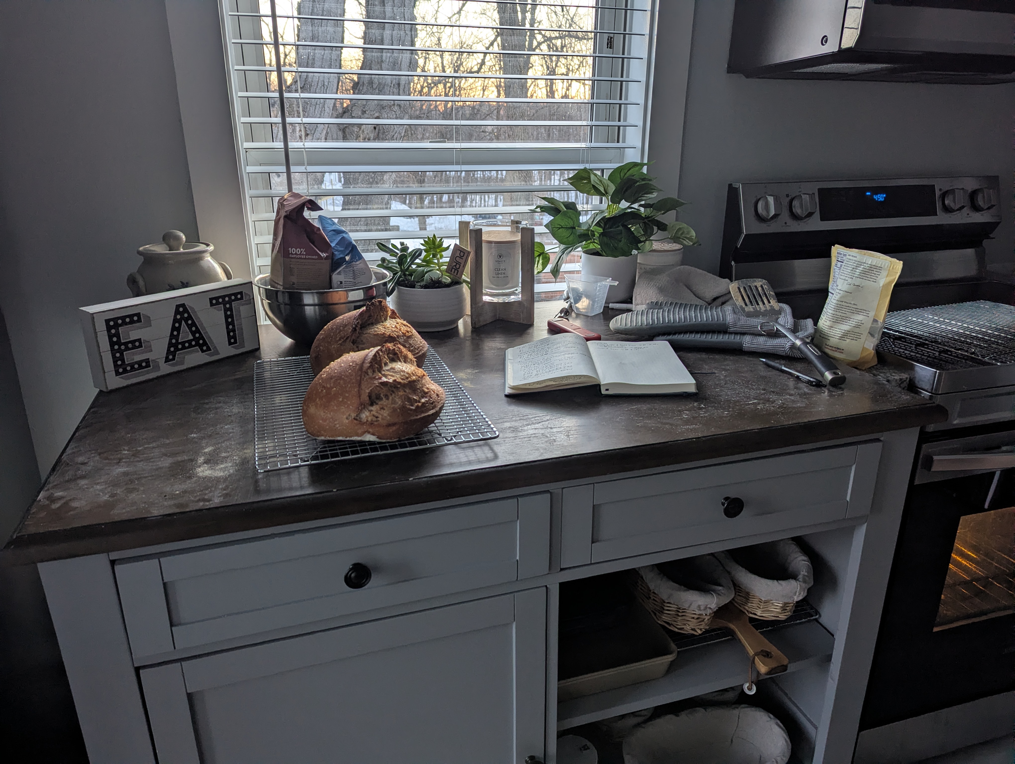 Artisan loaves cooling in kitchen with natural light